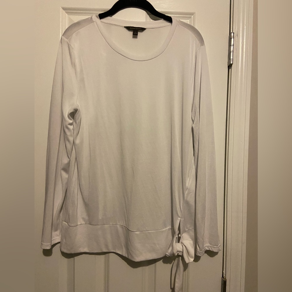 Soft white shirt with a knot on the side!